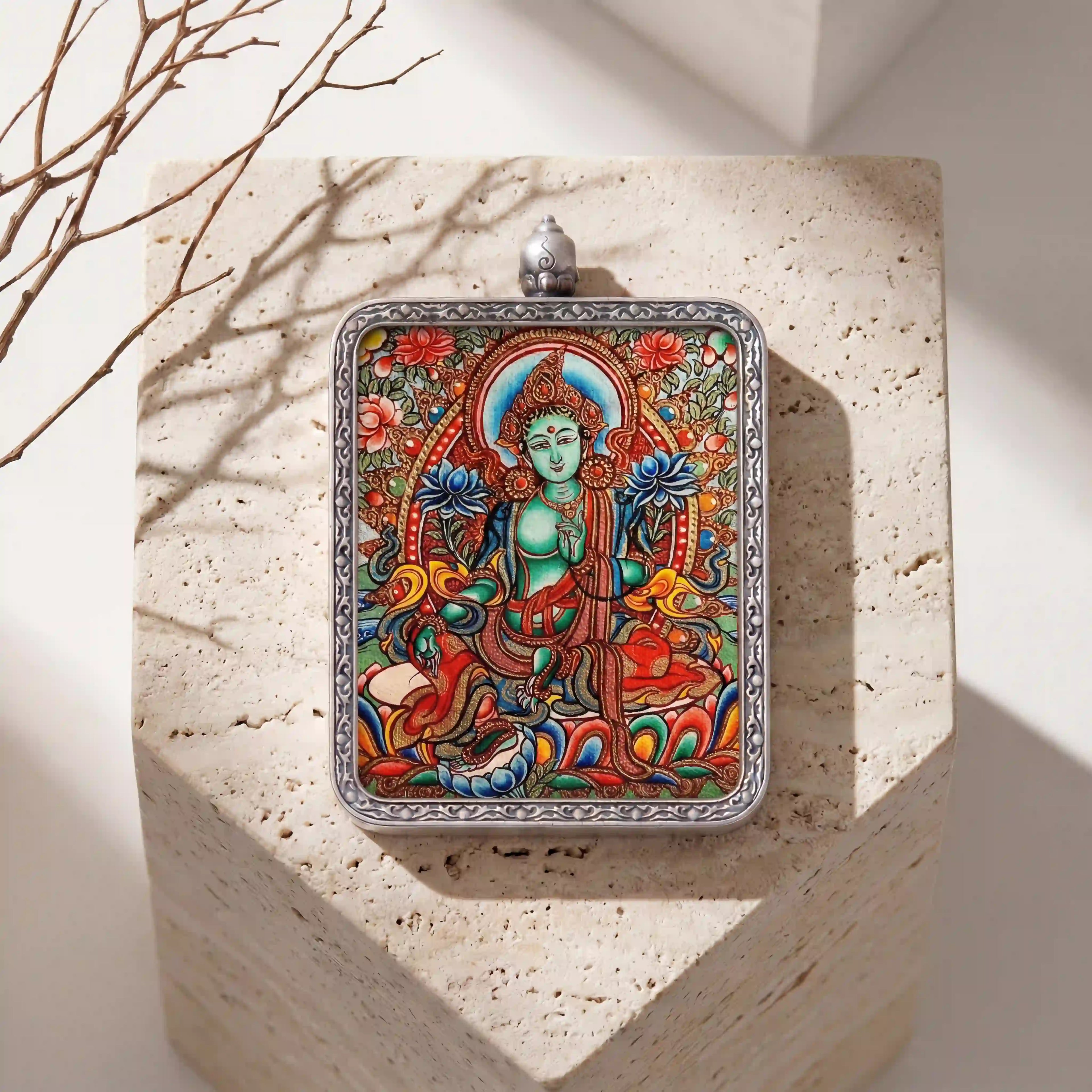 Luxury Green Tara spiritual jewelry for inner peace, hand-painted micro-Mandala inside a seamless silver amulet box by BEYUL ATELIER.